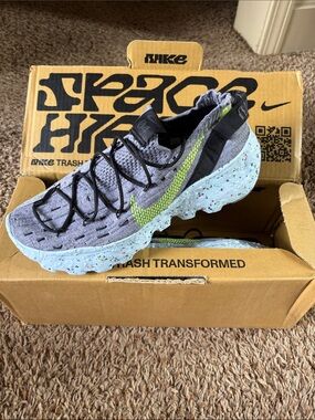 Nike Women’s Space Hippie 04 Sneakers in Light Blue, Gray & Volt